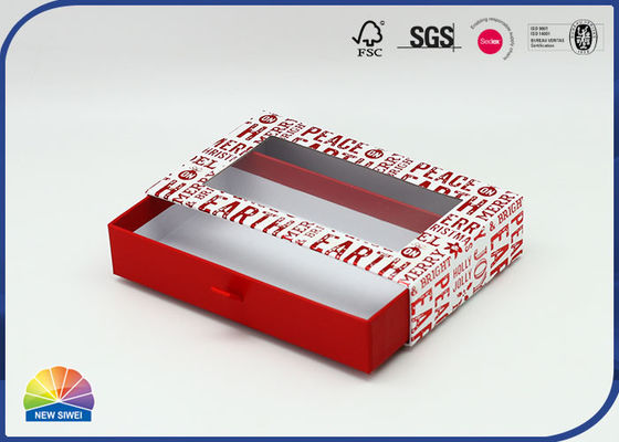 Confezione regalo in due pezzi con manico a nastro. Scatola con cassetto con finestra visibile